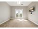 Bright bedroom with private balcony and natural light at 20148 E Windy Pine Pl, Parker, CO 80134