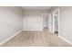 Neutral bedroom with carpet, cream walls, and an attached bath at 20148 E Windy Pine Pl, Parker, CO 80134