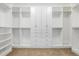 Spacious walk-in closet features custom shelving and ample storage space at 20148 E Windy Pine Pl, Parker, CO 80134