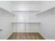 Empty walk-in closet with built-in shelving at 20148 E Windy Pine Pl, Parker, CO 80134