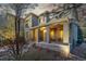Charming front porch with room for seating on a lovely, well-maintained home at 20148 E Windy Pine Pl, Parker, CO 80134