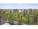 Aerial view of property surrounded by mature trees at 480 S Marion Pkwy # 901, Denver, CO 80209