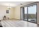 The dining area is open and features sliding doors that lead to the balcony at 480 S Marion Pkwy # 901, Denver, CO 80209