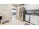 Eat-in kitchen with stainless steel appliances and ample counter space at 480 S Marion Pkwy # 901, Denver, CO 80209