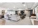 This condo's cozy living room offers comfortable seating and a stylish entertainment area at 480 S Marion Pkwy # 901, Denver, CO 80209