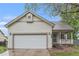 Charming single-Gathering home with a covered front porch and two-car garage at 5010 Golden Eagle Pkwy, Brighton, CO 80601