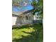Charming home with a front porch and well-kept lawn complemented by a wooden fence at 5010 Golden Eagle Pkwy, Brighton, CO 80601