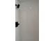 Stylish shower with gray backsplash, modern fixtures, and a shower head at 5010 Golden Eagle Pkwy, Brighton, CO 80601