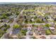 Picturesque aerial view of home showcasing neighborhood, tree-lined streets and proximity to local parks at 822 Poplar St, Denver, CO 80220