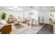 Finished basement with neutral colored furniture, plush rug, and light wood-look flooring at 822 Poplar St, Denver, CO 80220