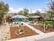 Beautiful home featuring xeriscaping and a charming front entrance at 822 Poplar St, Denver, CO 80220