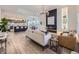 Spacious open-concept living area with a gourmet kitchen and modern decor at 1290 W Quincy Cir, Englewood, CO 80110
