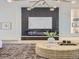 Beautifully decorated living room with a cozy fireplace and stylish accents at 1290 W Quincy Cir, Englewood, CO 80110