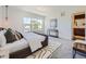 Serene main bedroom offering ample natural light, stylish decor, and a soothing ambiance at 1290 W Quincy Cir, Englewood, CO 80110