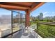 Relaxing balcony with views of city skyline, with comfortable seating for two at 100 Park W Ave # 301, Denver, CO 80205