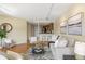 Cozy living room with modern decor and an open floor plan to the kitchen at 100 Park W Ave # 301, Denver, CO 80205