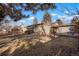 Charming single story home with a well-maintained lawn and mature trees at 3311 S Dahlia St, Denver, CO 80222