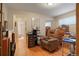 Office features hardwood floors, a comfortable recliner, and ample storage space at 3311 S Dahlia St, Denver, CO 80222