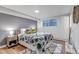 Inviting bedroom featuring a comfortable bed, soft lighting, and stylish accents at 3047 W 47Th Ave # 105, Denver, CO 80211