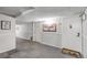 Well-maintained hallway features neutral decor and unit entrances at 3047 W 47Th Ave # 105, Denver, CO 80211