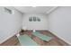 Home gym featuring new floor, yoga mats, and exercise equipment, providing a convenient space for staying fit at 6611 Lamar St, Arvada, CO 80003