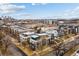 Beautiful Denver skyline view with Empower Field at Mile High, and modern residential homes in a desirable neighborhood at 2150 Eliot St, Denver, CO 80211