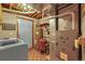 Basement laundry area with washer and dryer hookups, water heater, and furnace at 1673 Sinton Rd, Evergreen, CO 80439