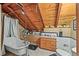 This bathroom includes wood paneled ceilings, a freestanding tub, and marble floors at 1673 Sinton Rd, Evergreen, CO 80439