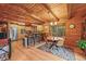Charming dining area with rustic wood elements, creating a cozy space for enjoying meals with Gathering and friends at 1673 Sinton Rd, Evergreen, CO 80439