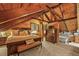 Serene main bedroom retreat with wood finishes, a spa-like en-suite bathroom, and ample natural light for relaxation at 1673 Sinton Rd, Evergreen, CO 80439