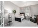 Cozy bedroom with a comfortable bed, soft lighting, neutral colors, and a relaxing atmosphere at 1038 Mircos St, Erie, CO 80516