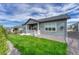Backyard of home featuring green lawn and pleasant outdoor space at 788 Alumroot St, Castle Rock, CO 80104