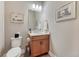 Well-lit powder room with stylish vanity and decor at 788 Alumroot St, Castle Rock, CO 80104