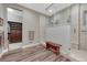A primary bathroom featuring a walk in shower and access to the closet at 788 Alumroot St, Castle Rock, CO 80104