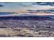 Distant view of houses and hillsides featuring snow capped mountains in the background at 788 Alumroot St, Castle Rock, CO 80104