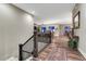 Inviting hallway with hardwood floors and stairs leading to living spaces at 788 Alumroot St, Castle Rock, CO 80104