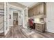 Dedicated home office features built-in storage and a comfortable workspace at 788 Alumroot St, Castle Rock, CO 80104
