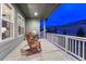 Covered patio with rocking chairs and a view at 788 Alumroot St, Castle Rock, CO 80104
