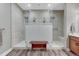 Modern shower room featuring dual shower heads and a built in bench at 788 Alumroot St, Castle Rock, CO 80104