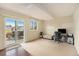 Bedroom with a sliding glass door leading to outdoor living space and lots of natural light at 19707 E Princeton Pl, Aurora, CO 80013