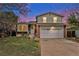 Charming two-story home with landscaped yard and a two car garage in a quiet neighborhood at 19707 E Princeton Pl, Aurora, CO 80013