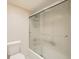 Clean bathroom featuring a tiled shower and standard toilet at 1551 Larimer St # 1402, Denver, CO 80202
