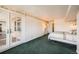Spacious bedroom with door to an outdoor patio and a comfortable bed at 1551 Larimer St # 1402, Denver, CO 80202