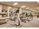 Gym featuring state-of-the-art fitness equipment and large mirrors at 1551 Larimer St # 1402, Denver, CO 80202