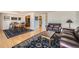 Open-concept living and dining area featuring hardwood floors and lots of natural light at 1551 Larimer St # 1402, Denver, CO 80202