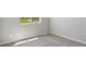 Bright bedroom with natural light and neutral carpeting and paint, perfect for relaxation at 7220 Dolores Ave, Frederick, CO 80530