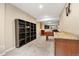 Finished basement area with neutral carpet, offering flexible space for recreation and entertainment at 2043 S Cathay Way, Aurora, CO 80013