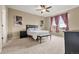 Comfortable bedroom with neutral carpet, natural lighting, and ample space for furnishings at 2043 S Cathay Way, Aurora, CO 80013