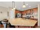 Spacious kitchen with granite countertops, stainless steel appliances and ample cabinet space at 2043 S Cathay Way, Aurora, CO 80013