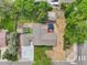 Aerial view of the home, showcasing the spacious backyard, landscaping, and overall property layout in the neighborhood at 9630 W 38Th Ave, Wheat Ridge, CO 80033